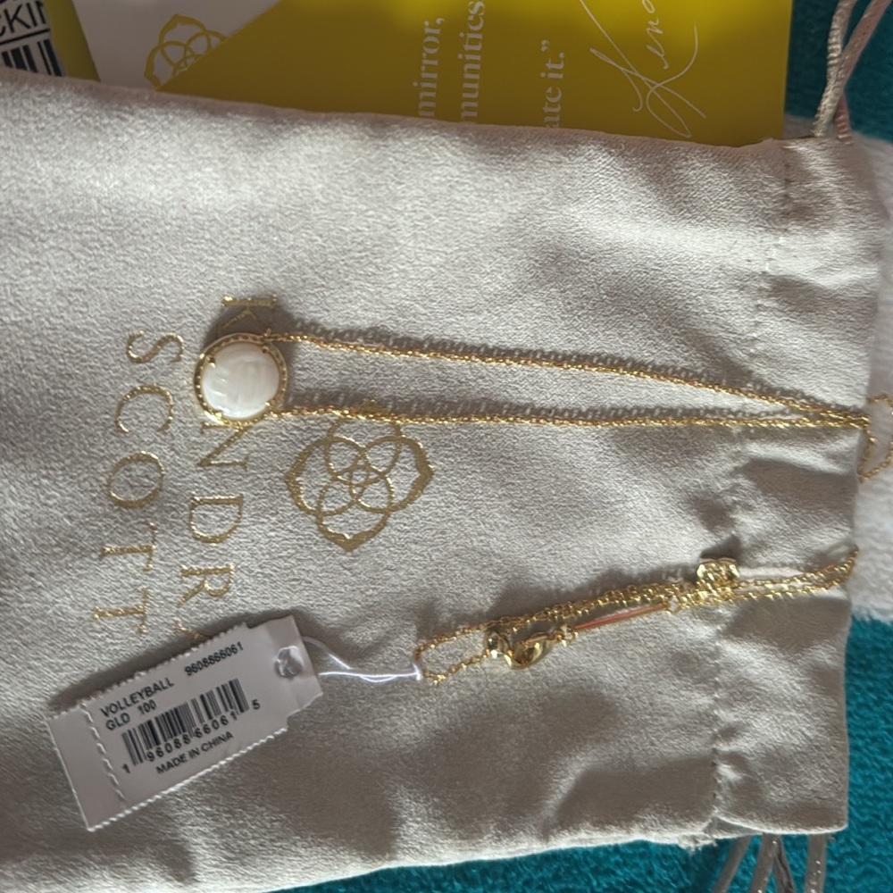 Gold Kendra Scott Volleyball necklace